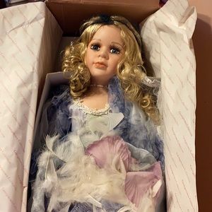 Porcelain collectible doll by Pamela Phillips